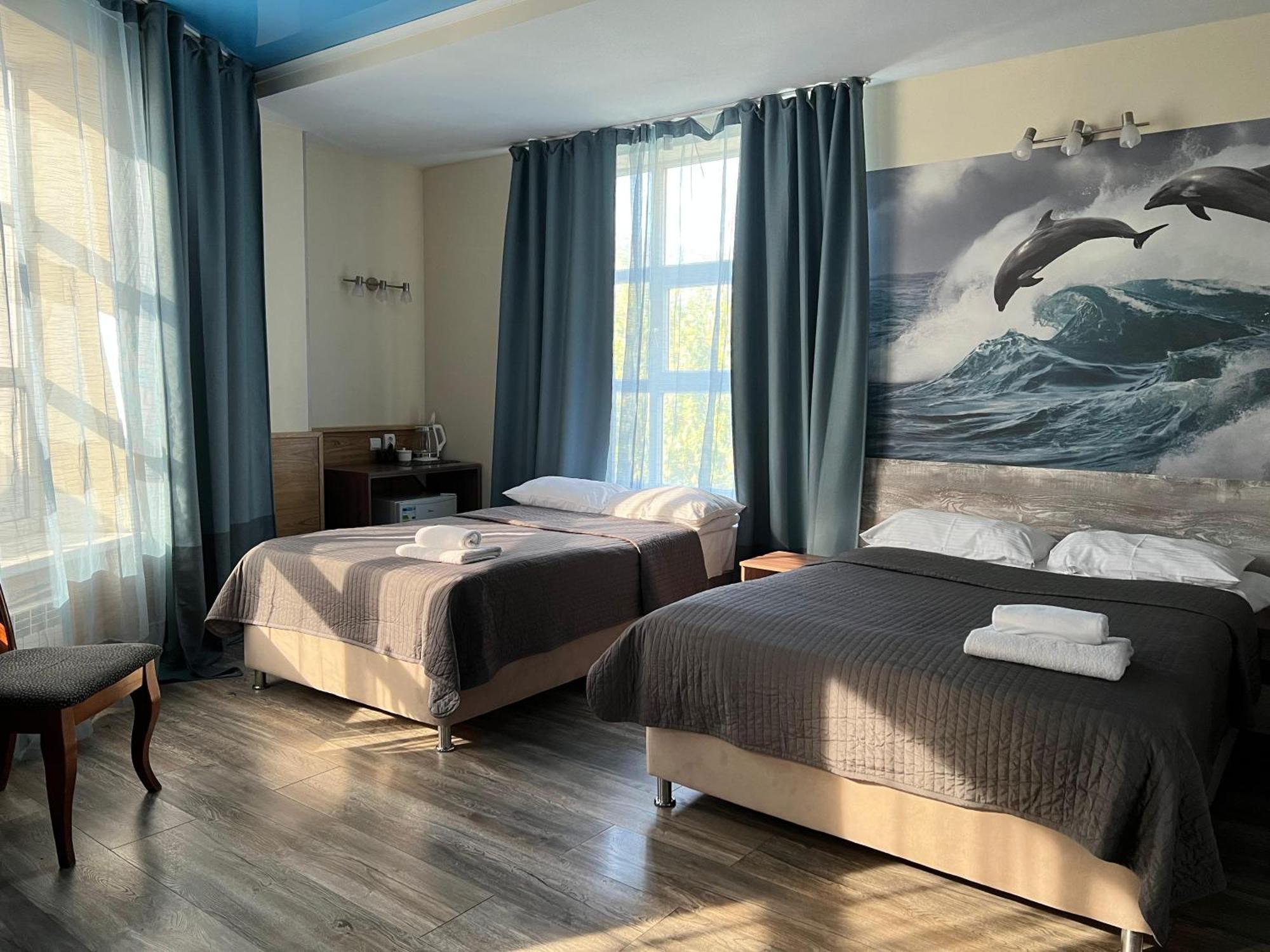 Three Dolphins Hotel Aktau  Ngoại thất bức ảnh